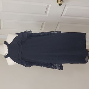 Nice  black dress, the sleeves bitted, size 10